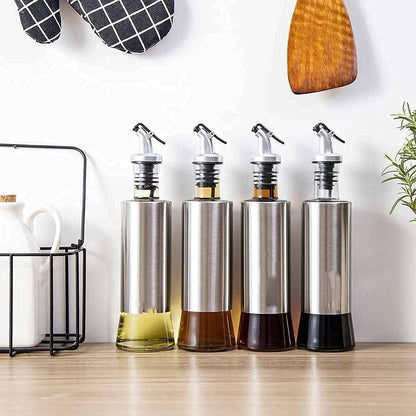 1 Glass Oil Bottle with Nozzle Head – 300ML Stainless Steel Case